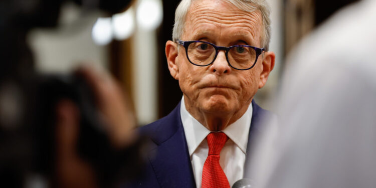 COLUMBUS, OH — AUGUST 26: Governor Mike DeWine talks with the press at a gubernatorial forum hosted by the Mid-Ohio Regional Planning Commission (MORPC) in partnership with the Ohio Association of Regional Councils (OARC), August 26, 2022, at the Hilton Columbus Downtown, in Columbus, Ohio. (Photo by Graham Stokes for the Ohio Capital Journal / Republish photo only with original story)