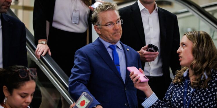 U.S. Senator Rand Paul (R-KY) speaks with reporters as he heads to a closed door meeting with Secretary of Defense Pete Hegseth and Secretary of State Marco Rubio in the basement of the U.S. Capitol building on November 5, 2025 in Washington, D.C. Secretaries Hegseth and Rubio are giving a a classified briefing on the recent military strikes on alleged Venezuelan drug boats to U.S. Senators today. (Photo by Samuel Corum/Sipa USA)(Sipa via AP Images)